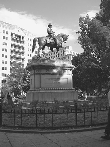 A view looking up at the statue of General James B. McPherson astride his