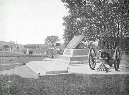 Cannons, monuments, and stone walls are part of the Gettysburg landscape.