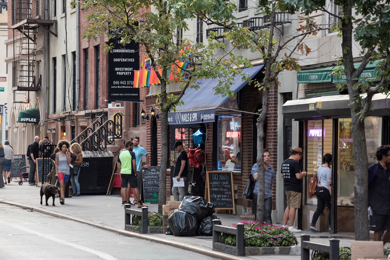 Street activity in front of Stonewall Inn