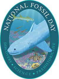 poster with blue border and an artist's rendering of a prehistoric shark. Title text includes "national fossil day".