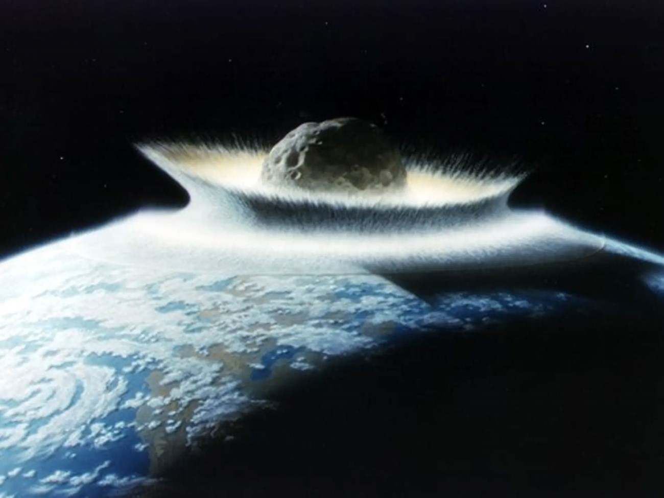 Artist’s impression of what an asteroid hitting the Earth might look like.