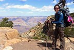tiny thumbnail of person standing near the rim of the grand canyon
