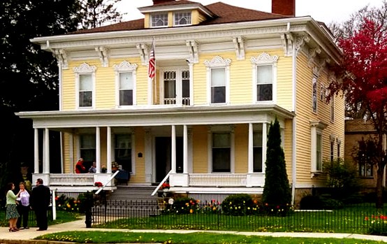 William H. Scheide House, a yellow clapboard house in Titusville, PA