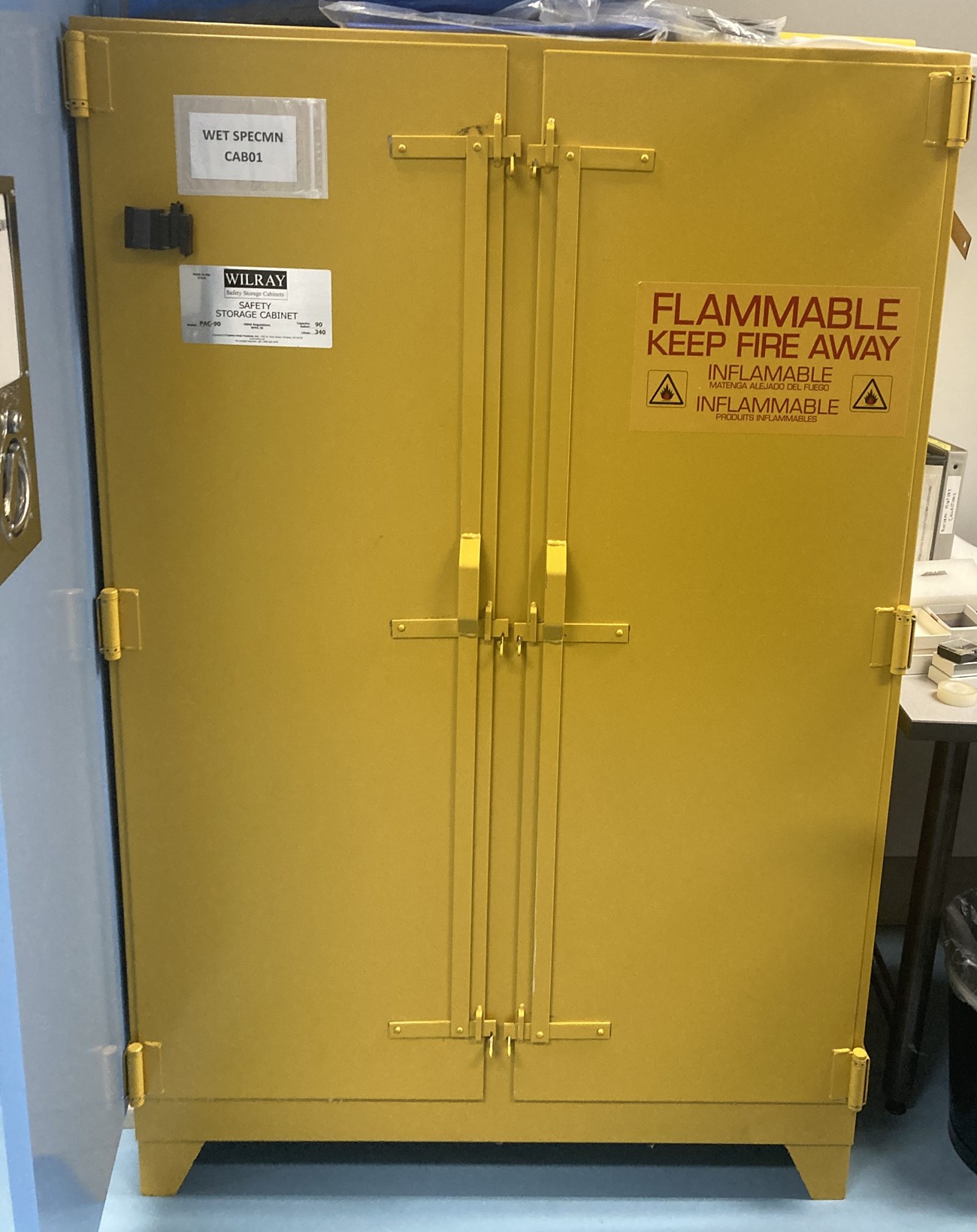 A yellow cabinet labeled "flammable"