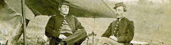 Captain Henry C. Newton, 93rd New York and an unidentified Union officer seated in front of a tent.