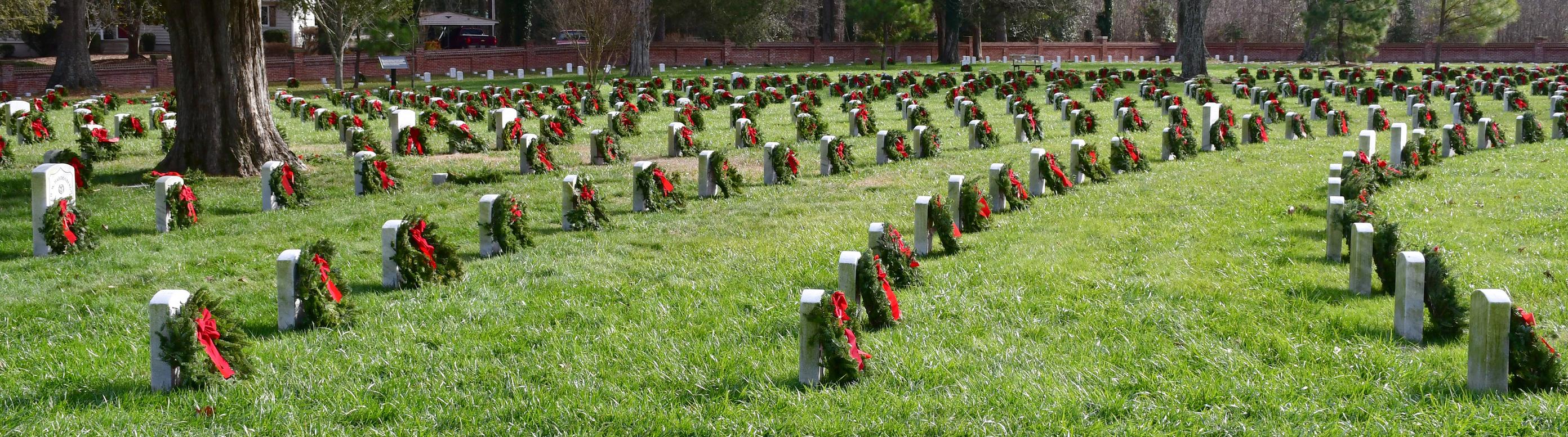 Wreaths on each grave accentuates the circular pattern of headstones at Poplar Grove National Cemetery.