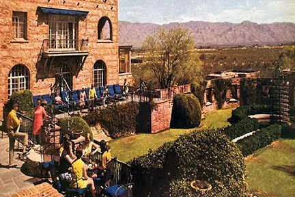 Drawing of building, terraces, patio, steps, and vegetation.