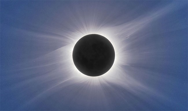 The moon blocks the sun's light to earth in this view of a total eclipse of the sun.