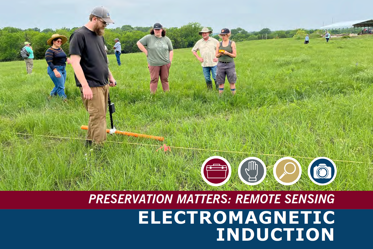 People in a grassy field using equipment