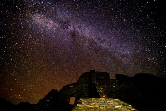 Milky Way rises about Puebloan ruins at Chaco Culture National Historical Park.