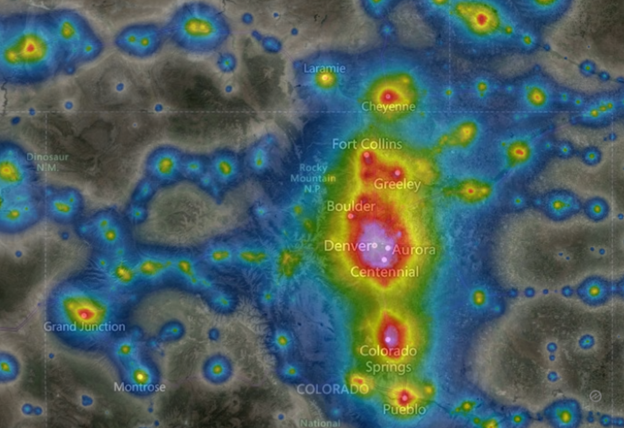 Bright colored map of continental US showing light pollution