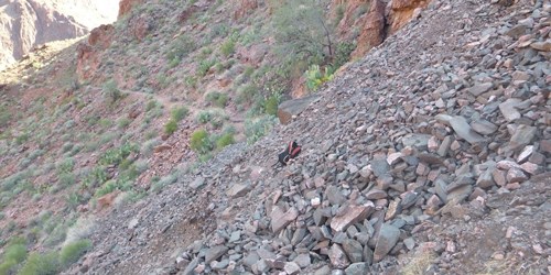 Rockslide covering part of a trail