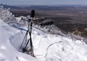 Sound equipment is installed on a snowy hillside at Mesa Verde National Park