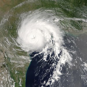 Hurricane making landfall over Texas. Mission Nuestra Señora de la Luz along the Trinity River was flooded by hurricanes.