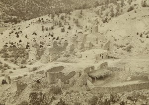 A view of the remains of the mission and surrounding buildings in the 1870s, showing local farmers and ranchers reoccupying the San José convento.