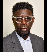 black man with glasses and afro