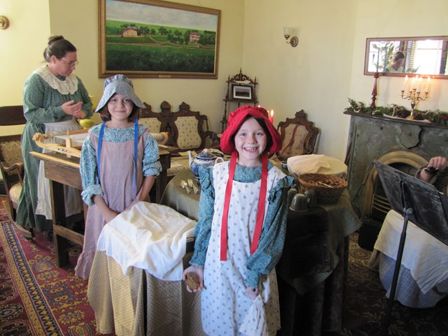 Women dress in historic outfits