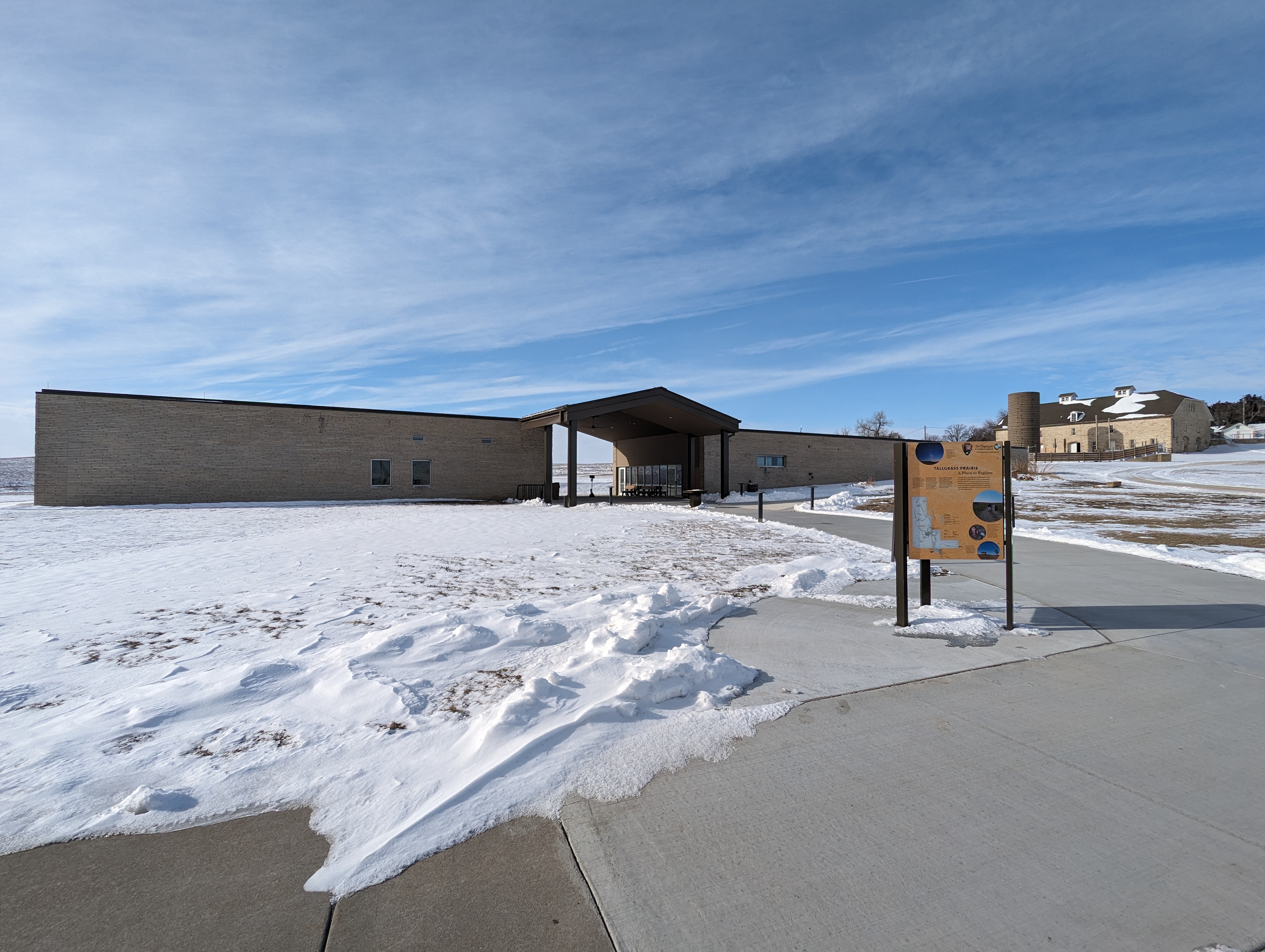 Photo of Visitor Center with snow in the foreground
