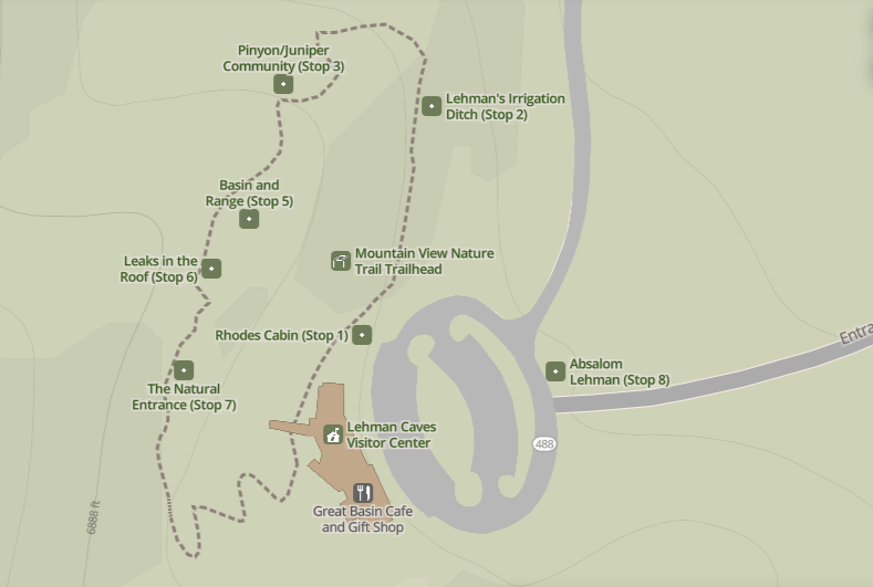 A selection of a digital-only map of the national park. The green background shows a grey road arriving at a Visitor Center and a trail surrounding it. Stops are noted on the trail for the associated self-guided tour.