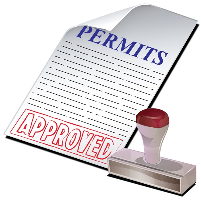 A permit application stamped with approval