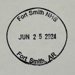 A circular ink stamp with the text, "Fort Smith NHS, JUN 25 2024, Fort Smith, AR."
