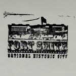 Image: Flag flying over fort buildings Text: Fort Smith National Historic Site