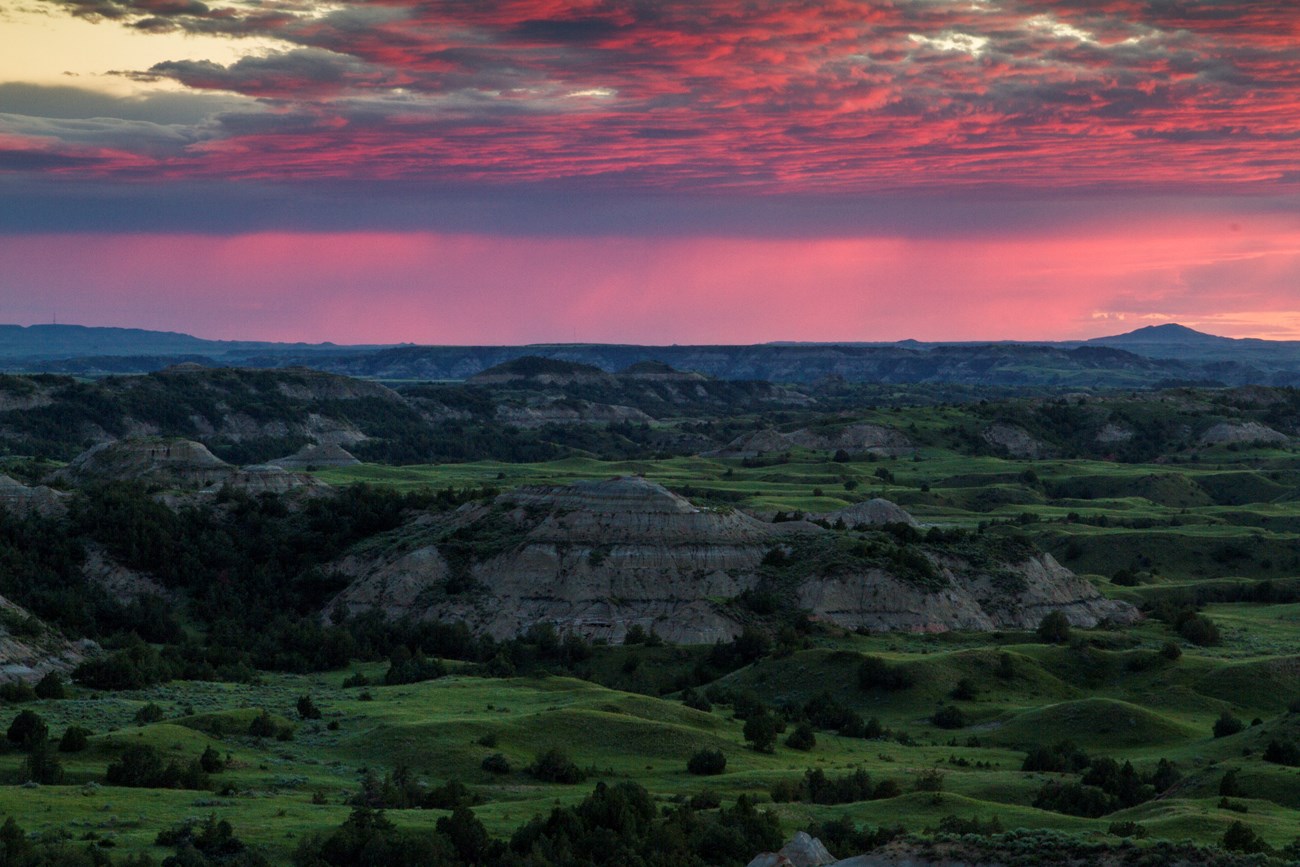 Theodore Roosevelt National Park Wilderness with a sunset in the background