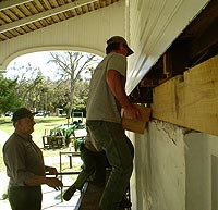 Preservation staff replace sill beams in historic building at Kingsley Plantation.