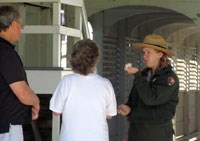 Ranger with two visitors during a program.