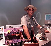 Park ranger at the visitor center desk.