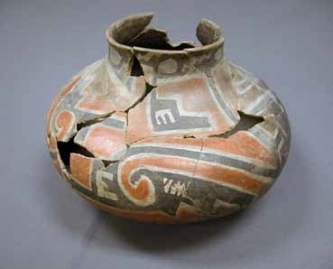 Tonto Polychrome vessel with red, black, and white exterior.