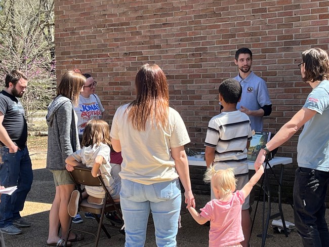 A volunteer giving a pop-up demonstration.