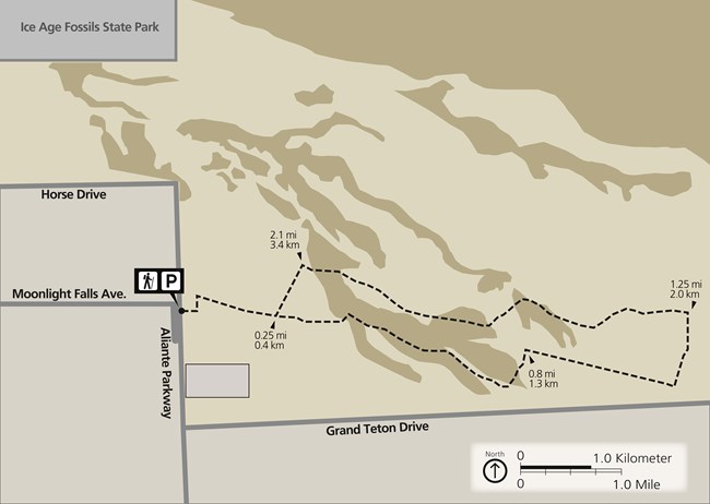 A "lollipop"-shaped loop trail. Trailhead parking is located on the west side of the trail