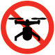 Red circular icon with slash through it over black sihouette of a drone