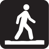 black and white icon of person walking on a trail/path, shown in white