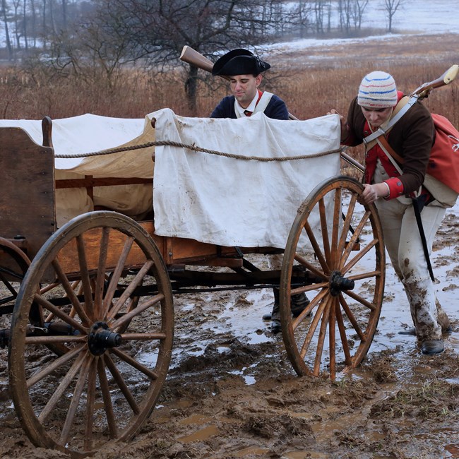 outdoors, mud, wagon, soldiers