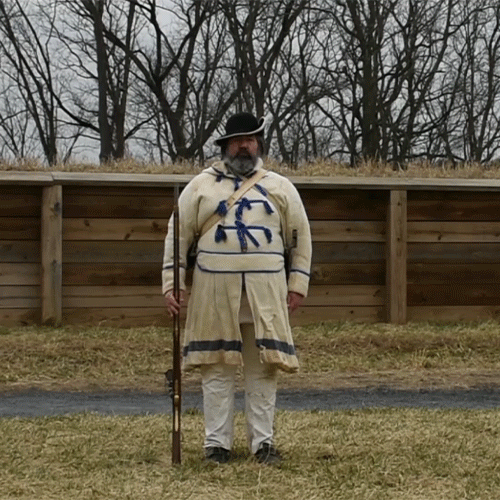 animated gif from video, soldier picks up musket and moves it to opposite shoulder