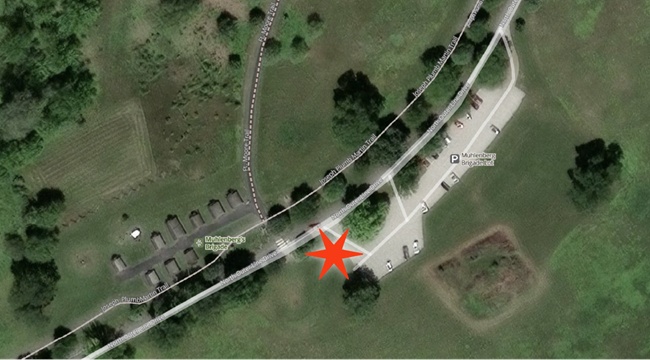 Aerial satellite image of Muhlenberg's Brigade area with red star marking pick-up/drop-off location.
