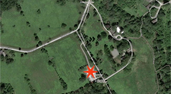 Aerial photo of Wilson Rd area with star in the parking lot marking pick up drop off location