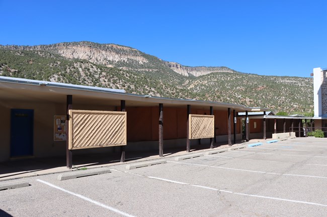 A conference center with a beautiful backdrop of canyon walls.