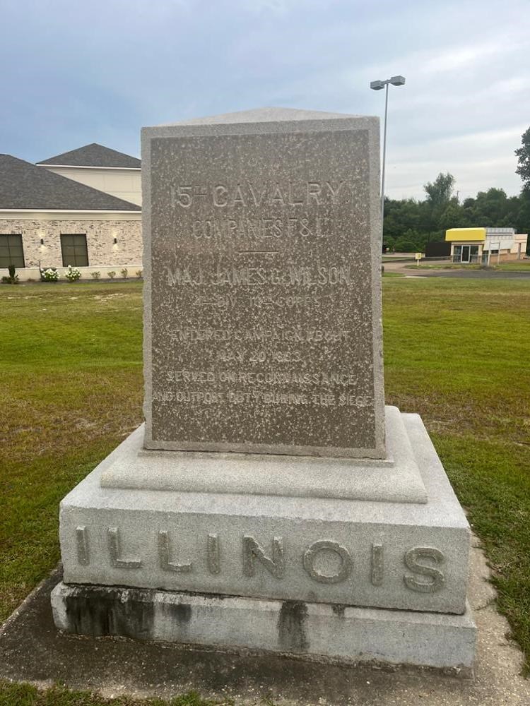 Square Rectangular stone monument with ILLINOIS written on its base