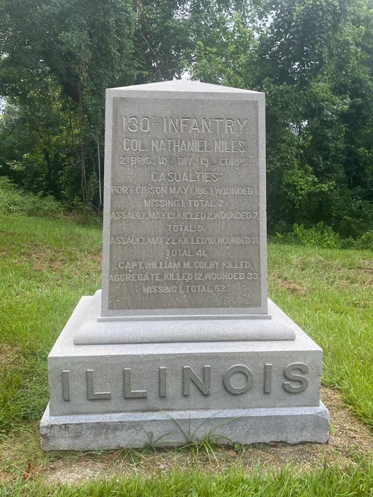 Square Rectangular stone monument with ILLINOIS written on its base