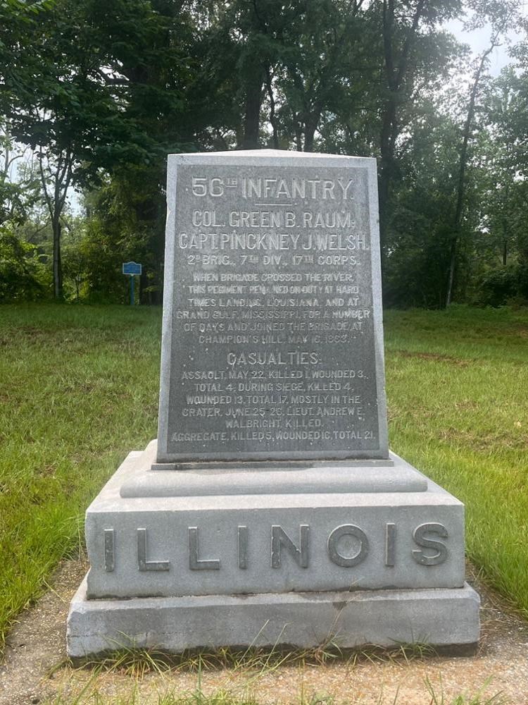 Square Rectangular stone monument with ILLINOIS written on its base