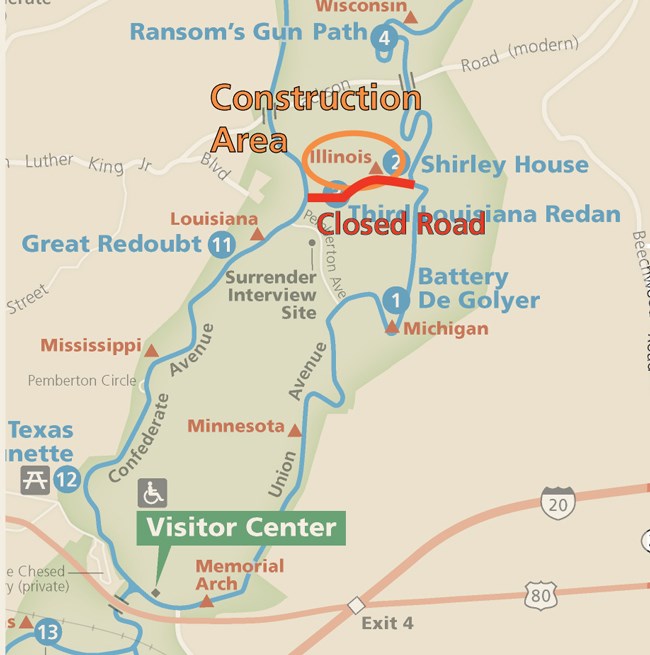 Map of the park. In the center is a large orange circle around the world Illinois. Overlay on the map next to the circle are the words Construction Area. there is a section of road marked in red. Below are the words Closed Road