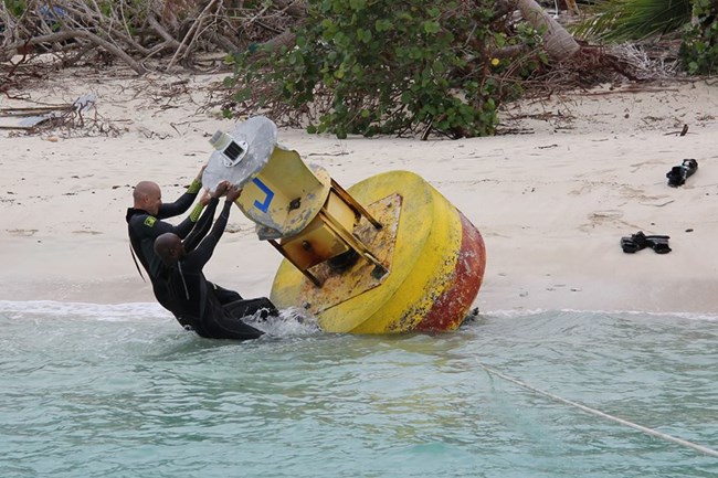 Divers Replacing Johnsons Buoy