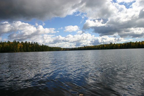 Partly Cloudy skies over a lake