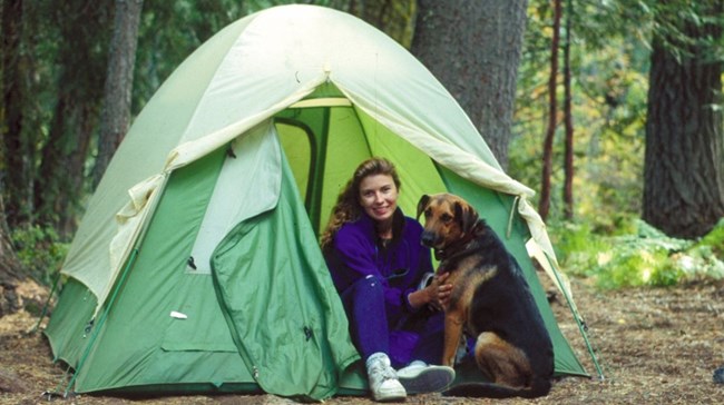 A backcountry camper and her dog at Whiskeytown.