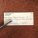 A check and pen