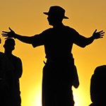 Silhouette of ranger with hands extended
