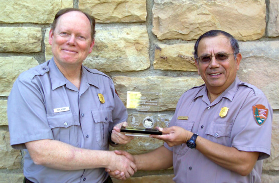 Dan Roddy receiving his Regional Natural Resource Management Award from park superintendent Vidal Davila.